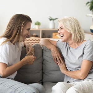 Ladies converse on couch