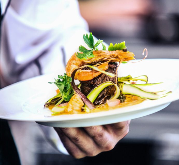Pizza and wine on a table in Austin