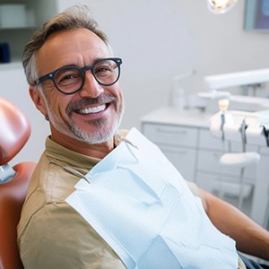 Smiling middle-aged dental patient