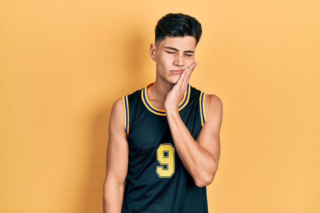 A basketball player with a dental emergency